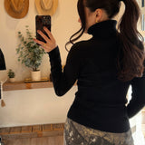Black Flower Point Turtle Neck Sweater