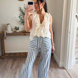 Cream Waterfall Ruffle V-Neck Top